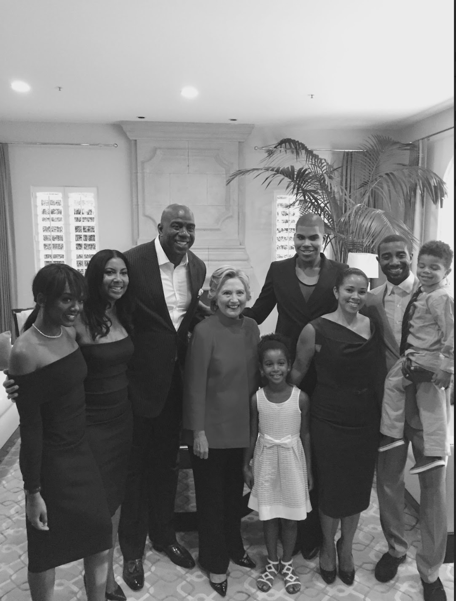 Hope for the future: Gigi Johnson and her family pose for a photo with Hillary Clinton, an inspiration for women all over the country